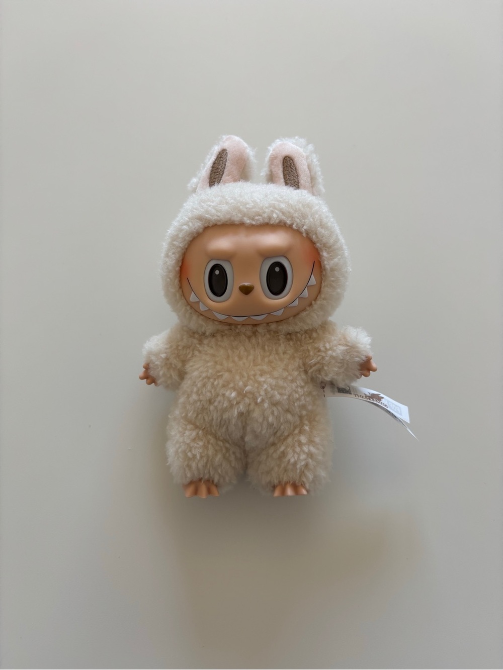 Cream labubu doll from popmart